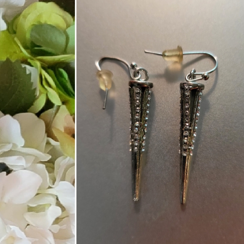 Silver spike earrings with diamond accents